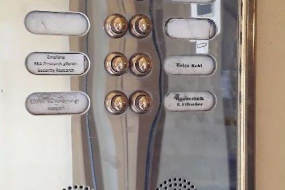 Arrow points to bell top right TISS