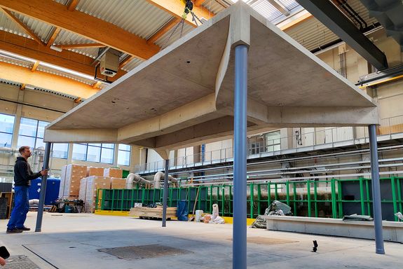A concrete slab resting on columns. The slab itself has reinforcements in a few places.