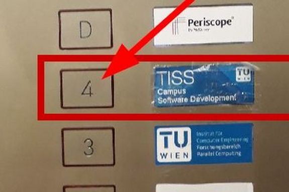 Arrow points to button for the 4th floor in the elevator