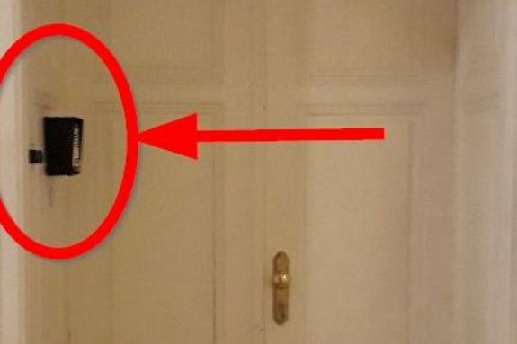 View TISS office white double door with arrow to bell left